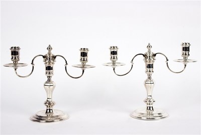 Lot 75 - A pair of Regent plate two-branch two-light...