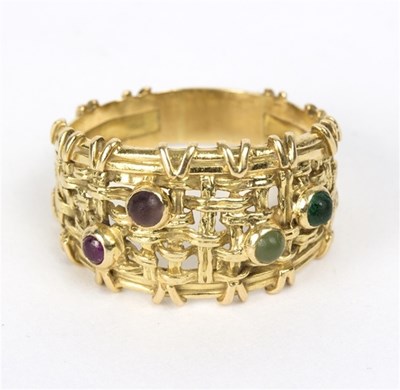 Lot 106 - A multi-gem set dress ring of basket weave...