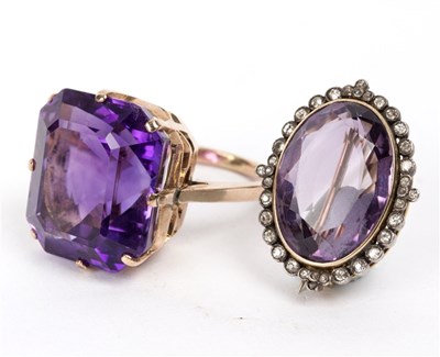 Lot 110 - A Victorian oval amethyst and diamond brooch,...