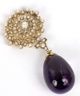 Lot 127 - A Victorian amethyst pendant/brooch, the large...