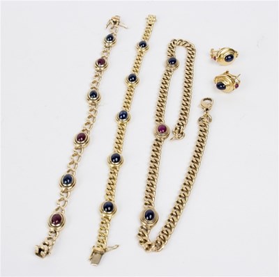Lot 130 - A sapphire and ruby cabochon set necklace and...