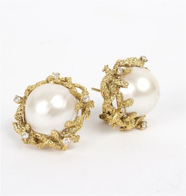 Lot 136 - A pair of mabe pearl and diamond ear clips,...