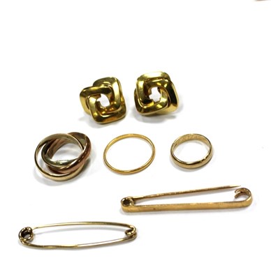 Lot 162 - A 9ct tri-colour gold puzzle ring, a 9ct...
