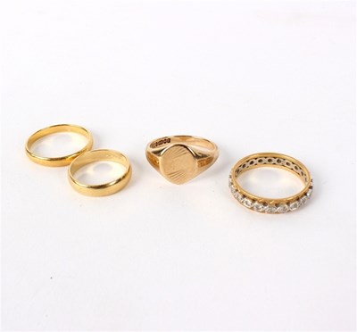 Lot 172 - An 18ct gold eternity ring set with small...
