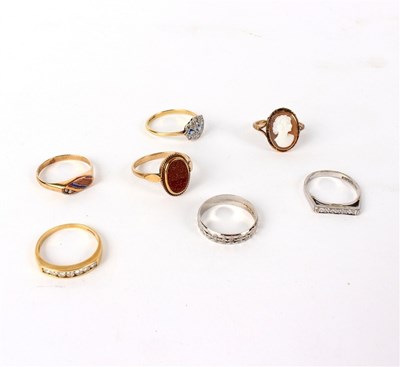 Lot 173 - A seven-stone diamond ring set in 18ct gold, a...