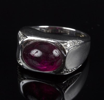Lot 178 - A rubellite and diamond dress ring, the oval...