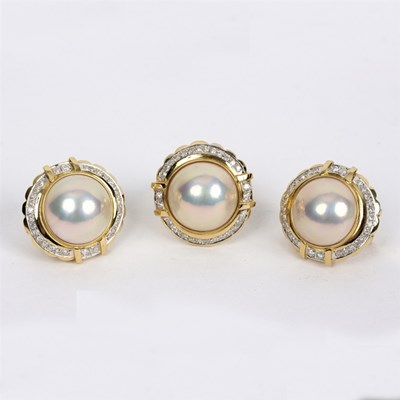 Lot 186 - A mabe pearl and diamond dress ring and...