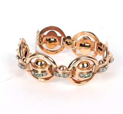 Lot 192 - A gold, diamond and emerald bracelet, the six...