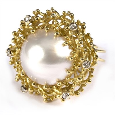 Lot 199A - A mabe pearl and diamond dress ring, the...