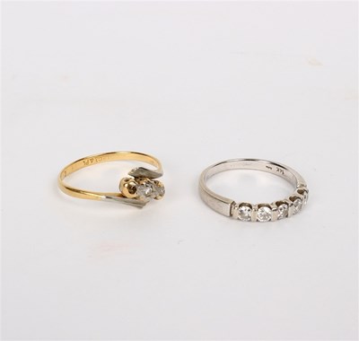 Lot 203 - A five-stone diamond ring set in 14k white...
