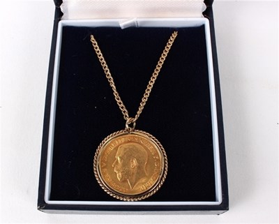 Lot 209 - A George V gold sovereign mounted as a pendant...