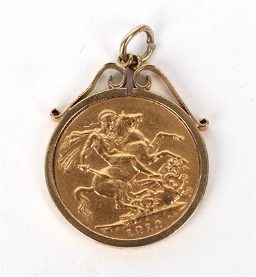 Lot 210 - An Edward VII sovereign 1910, in a 9ct gold...