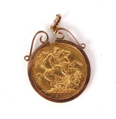 Lot 213 - An Edward VII gold sovereign, 1910, in a gold...