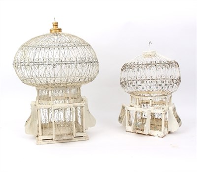 Lot 282 - Two lantern style wirework birdcages painted...