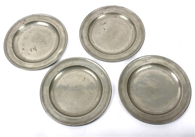 Lot 291 - A pewter charger with incised border,...