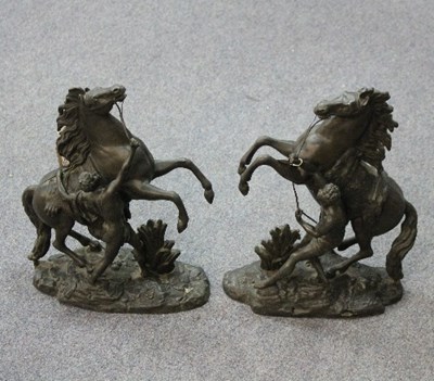 Lot 297 - Two spelter Marly type horses, 40cm high