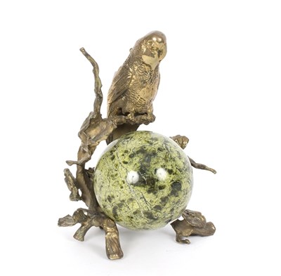 Lot 302 - A desk ornament modelled as a parrot on a...