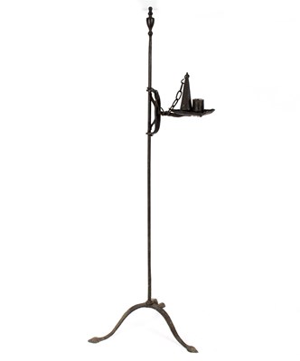 Lot 305 - A wrought iron adjustable candle stand, with...