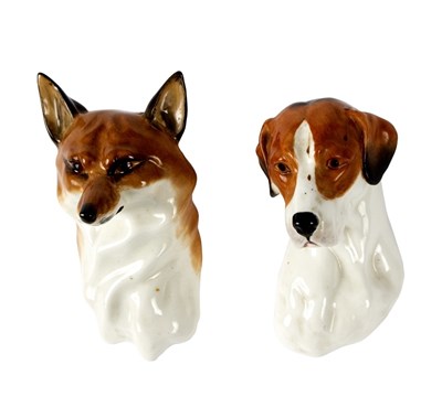 Lot 371 - A pair of Royal Worcester fox and hound wall...