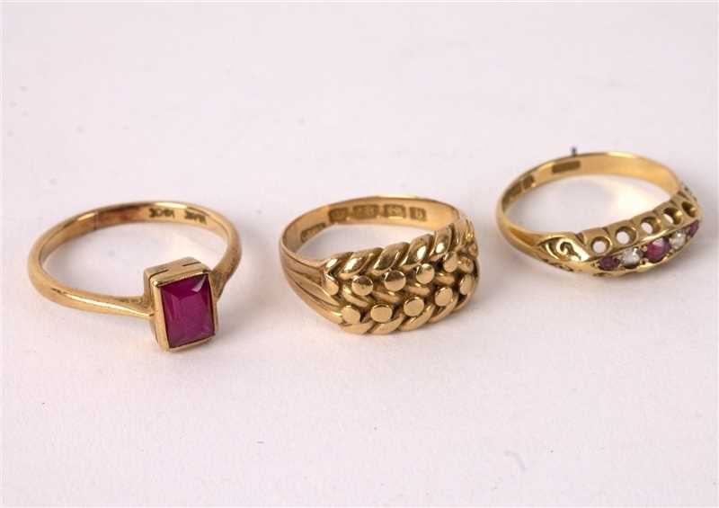 Lot 3 - A ruby and diamond five-stone ring, set in...