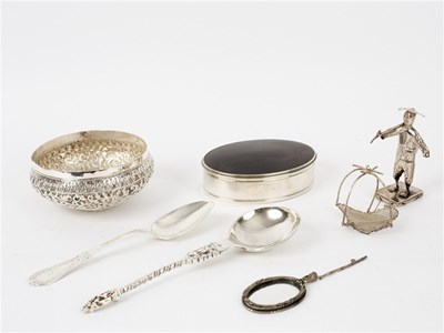 Lot 82 - An oval white metal mounted tortoiseshell box,...