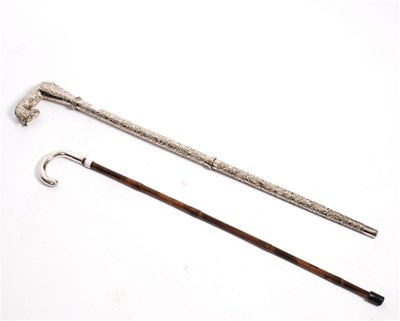 Lot 206 - An Edwardian bamboo cane, the plain silver...