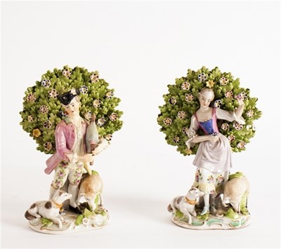 Lot 255 - A pair of ceramic figures, piper with...