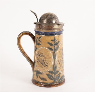 Lot 265 - A Doulton Lambeth stoneware tankard, with...