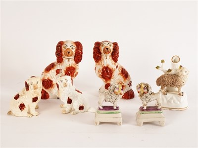 Lot 272 - A pair of Staffordshire liver and white dogs,...