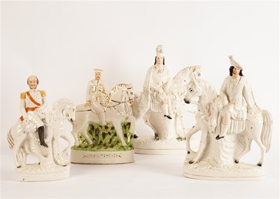 Lot 277 - A pair of Staffordshire figures on horseback,...