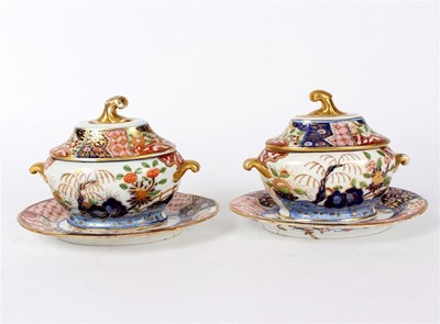 Lot 289 - A pair of Coalport Imari pattern sauce tureens,...