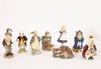 Lot 293 - A collection of eight Beswick Alice Series...