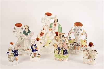 Lot 302 - A named Staffordshire spill vase group, 'Dog...