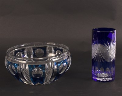 Lot 317 - A circular cut glass bowl with blue ribbed...
