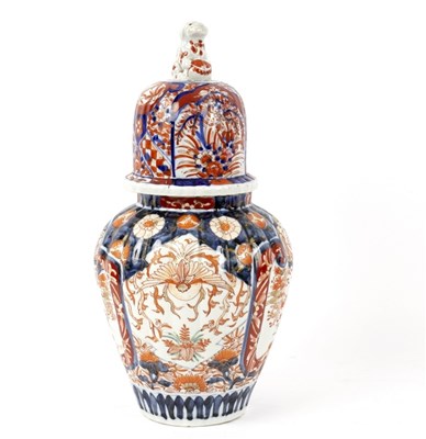 Lot 333 - A Japanese Imari vase and cover of reeded form,...