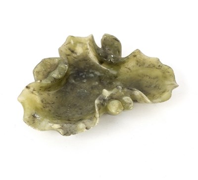 Lot 334 - A Chinese jade leaf-shaped dish with bud to...