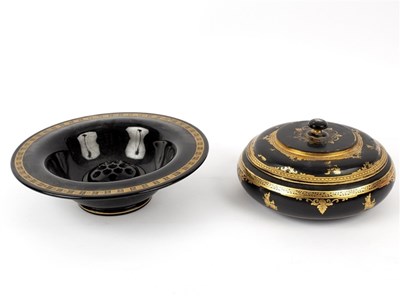 Lot 336 - An Oriental black and gold lacquer circular...