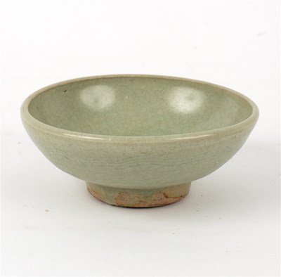 Lot 355 - A Chinese celadon bowl, Yuan dynasty, with...