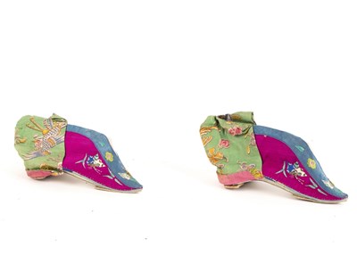Lot 370 - A pair of Chinese shoes in printed and...