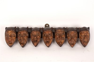 Lot 397 - A pipe rack for seven pipes, the supports in...