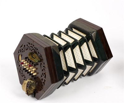 Lot 418 - A rosewood cased 48 key concertina, by Charles...