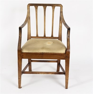 Lot 550 - A George III mahogany elbow chair with slatted...