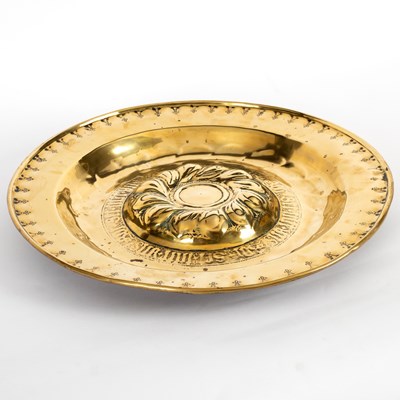 Lot 13 - A Nuremberg brass alms dish with embossed...