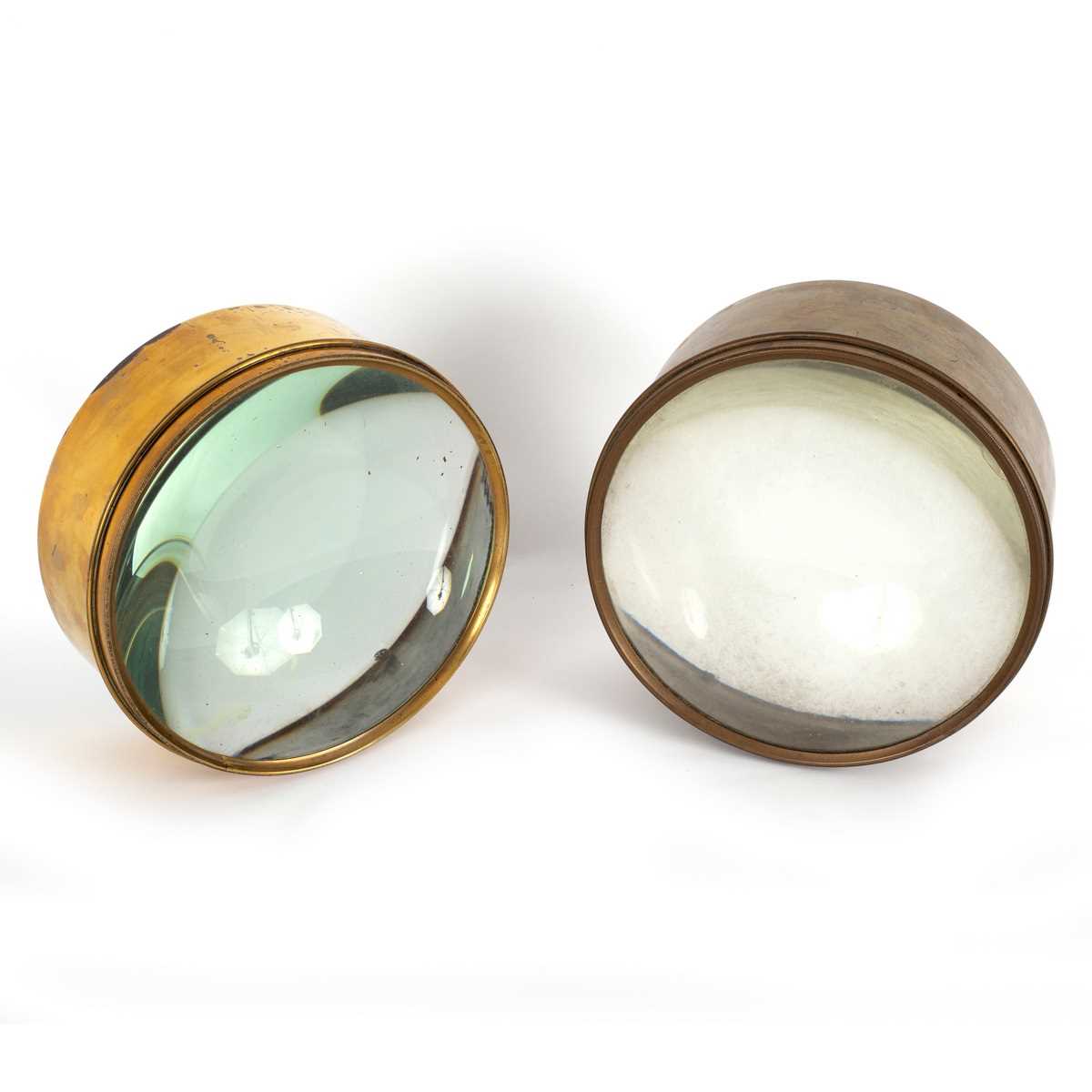 Lot 14 - Two circular brass mounted magnifying lenses,...