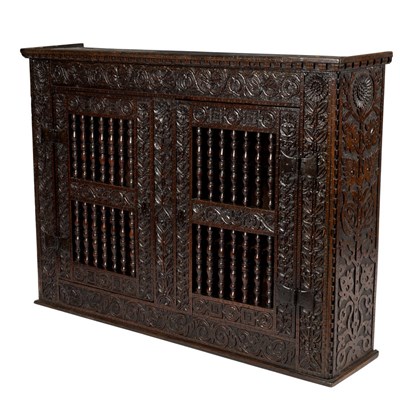Lot 23 - A 17th Century oak hanging cupboard, with...