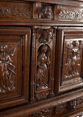 Lot 31 - A Flemish oak side cabinet, 16th Century and...