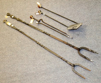 Lot 40 - A quantity of wrought iron and other fire irons