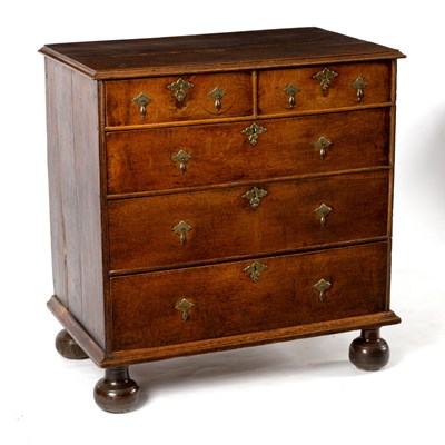 Lot 61 - An early 18th Century oak chest fitted three...