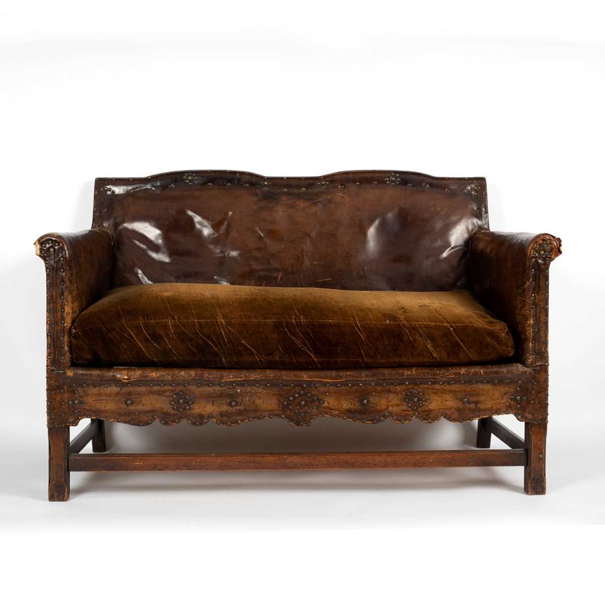 Lot 74 - A leather sofa and two matching armchairs