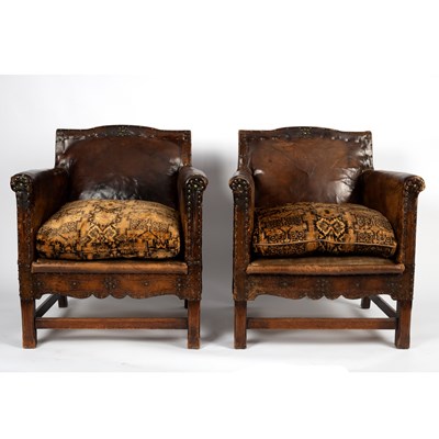 Lot 74 - A leather sofa and two matching armchairs